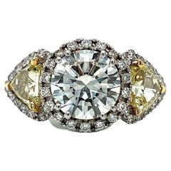 18 Karat White Gold Brilliant Cut Fancy Yellow Trillion Diamond Engagement Ring