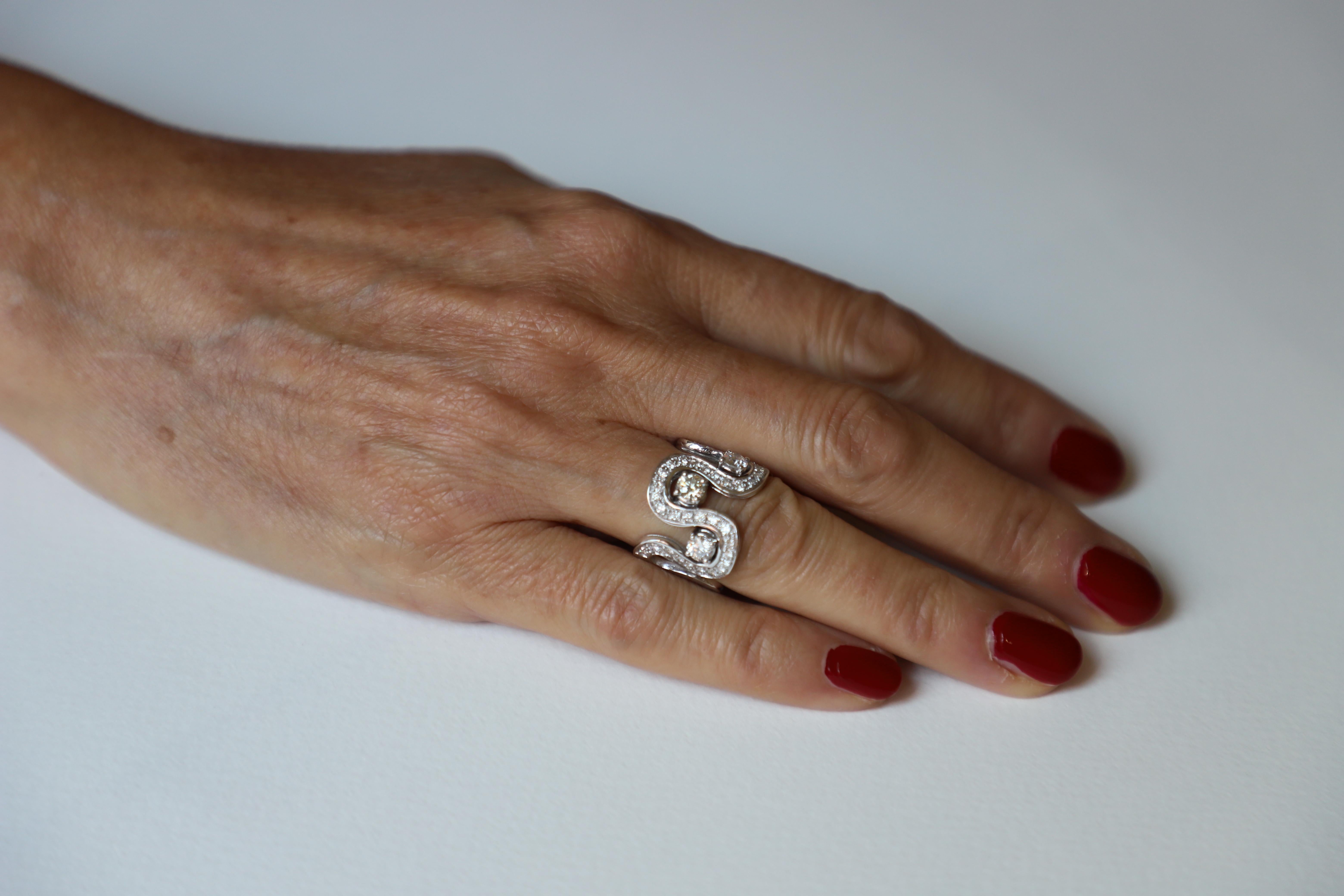 Modern 1.54 Karats G Color VVs1 White Diamonds 18 Karat White Gold Design Ring For Sale