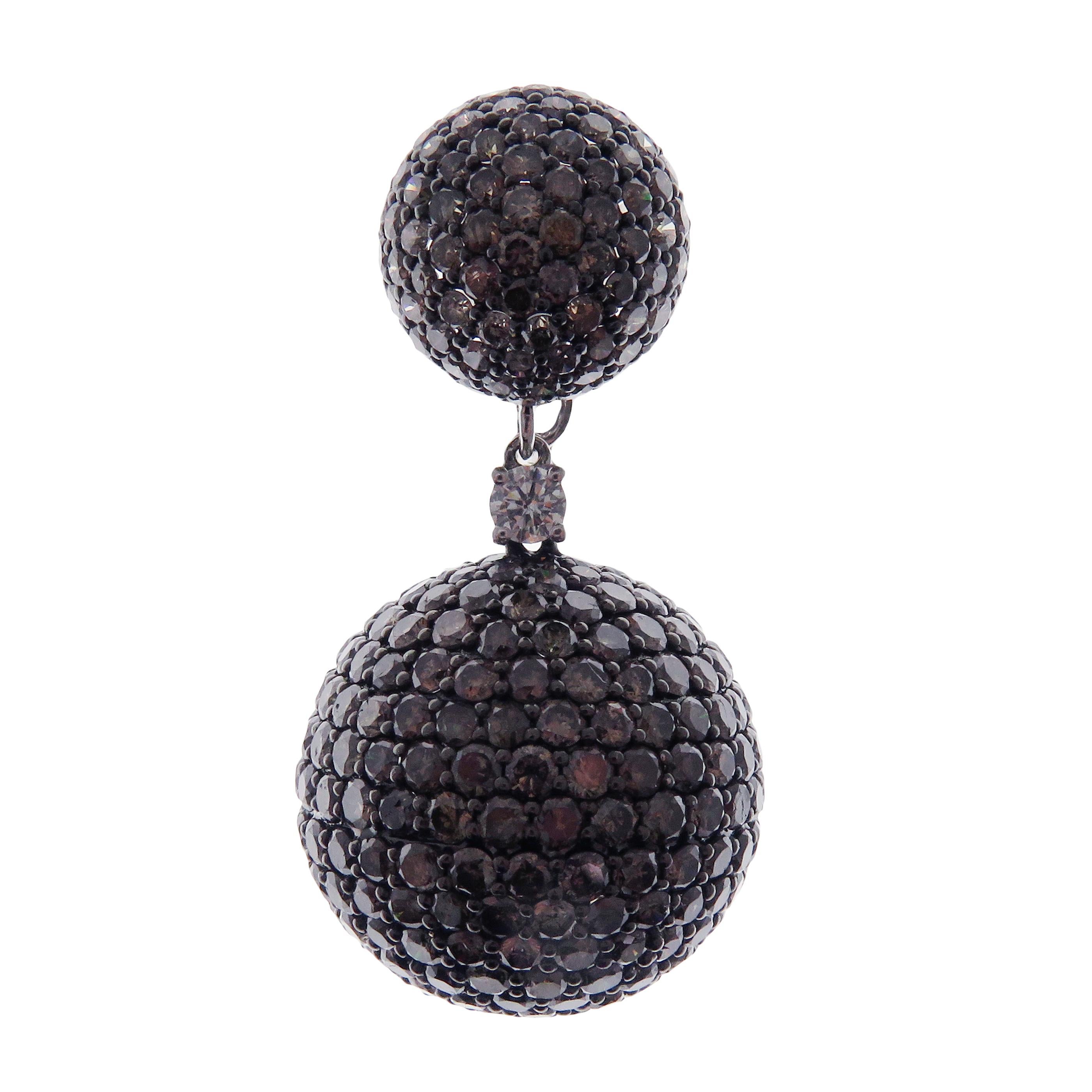 These ball pave earrings are crafted in 18-karat white gold, weighing approximately 27.10 carats of Brown diamond with 786 round diamonds. French clip backing on top. 

Beautiful 0.15 pt white diamond accent on each earring and multi-functional