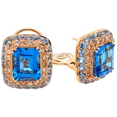 Pendientes de oro rosa de 18 quilates con diamantes marrones y topacio azul