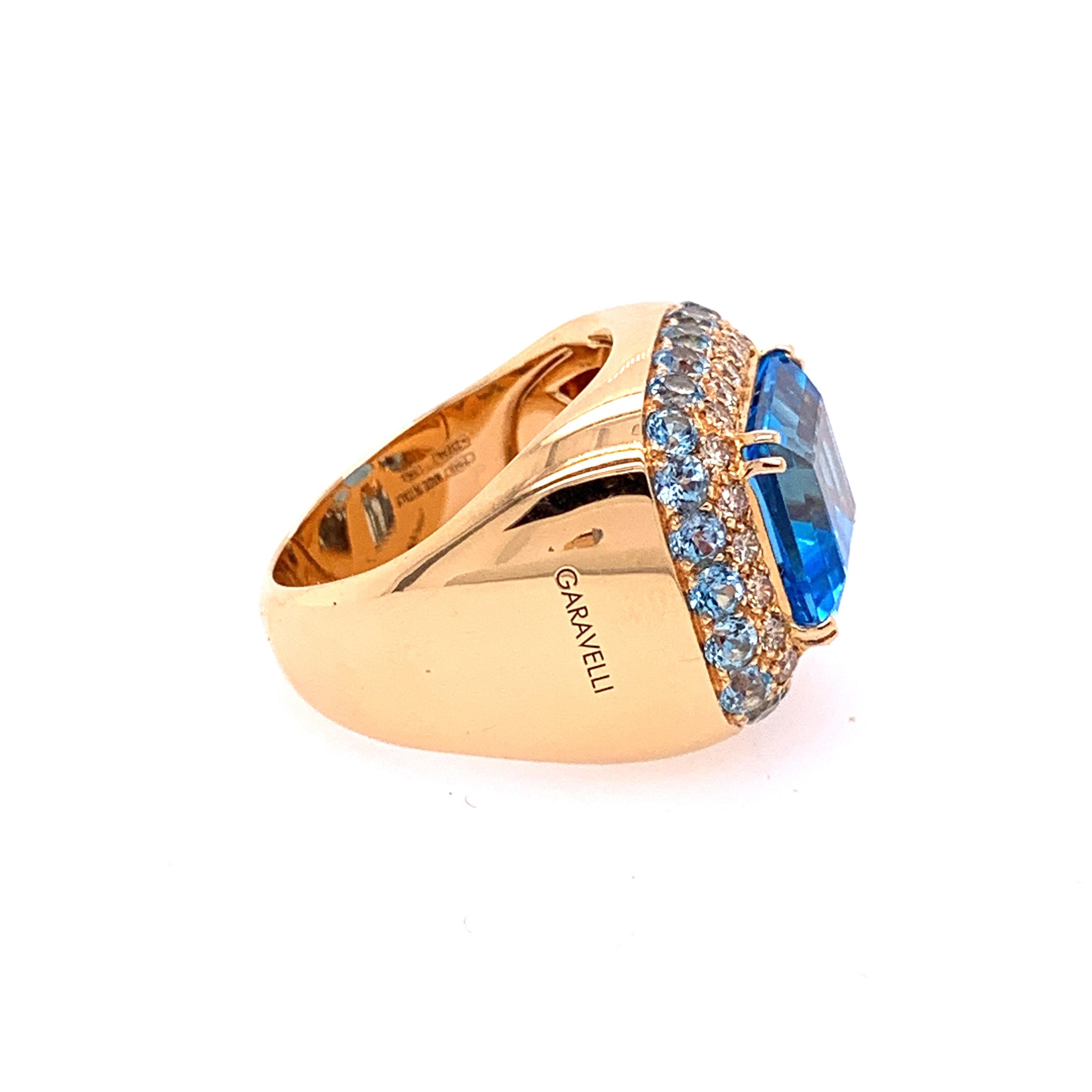 Round Cut 18 Karat White Gold Brown Diamonds and Blue Topaz Ring For Sale