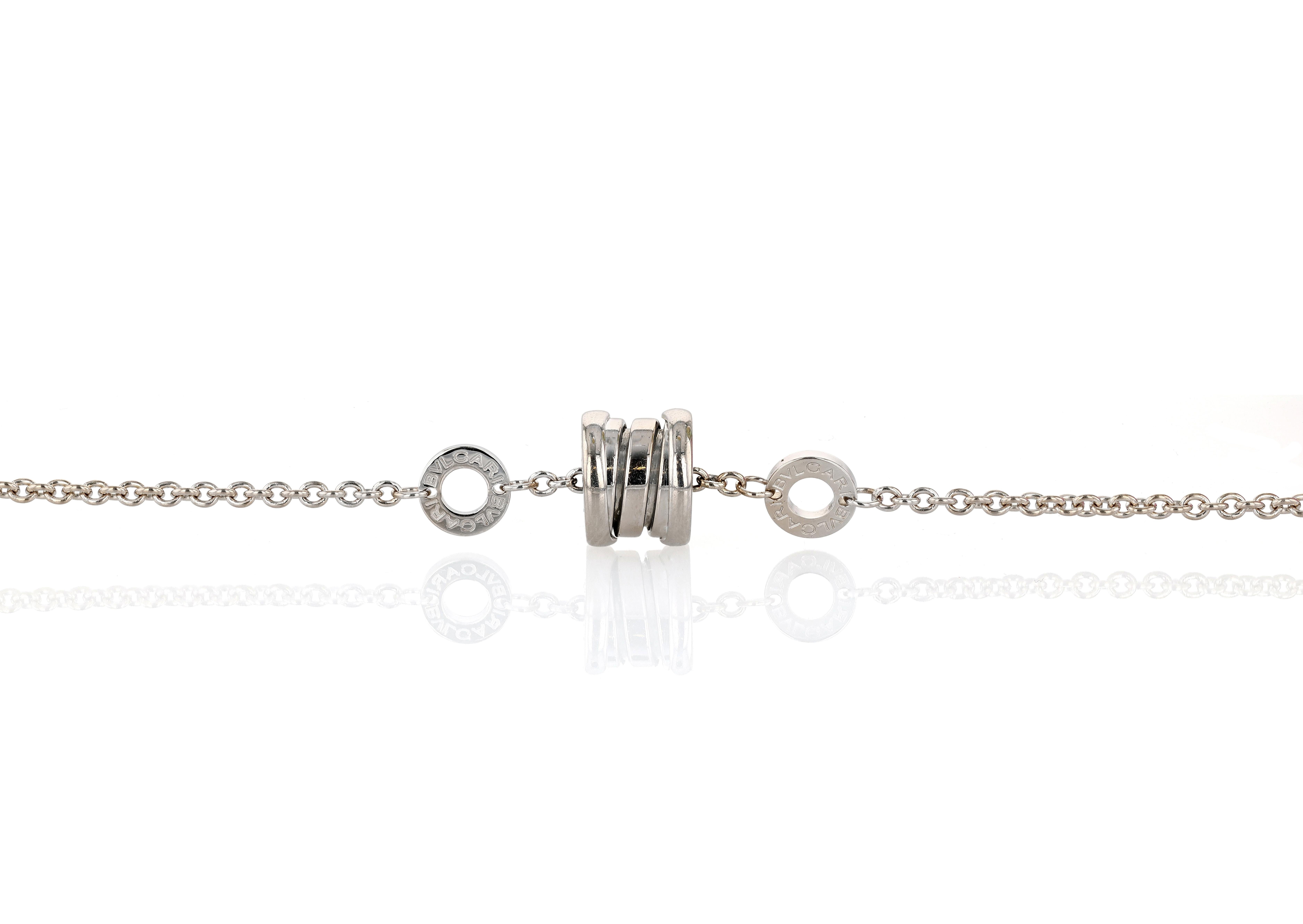 An 18 karat white gold Bulgari B-Zero station bracelet featuring the iconic B-Zero motif housed between two 