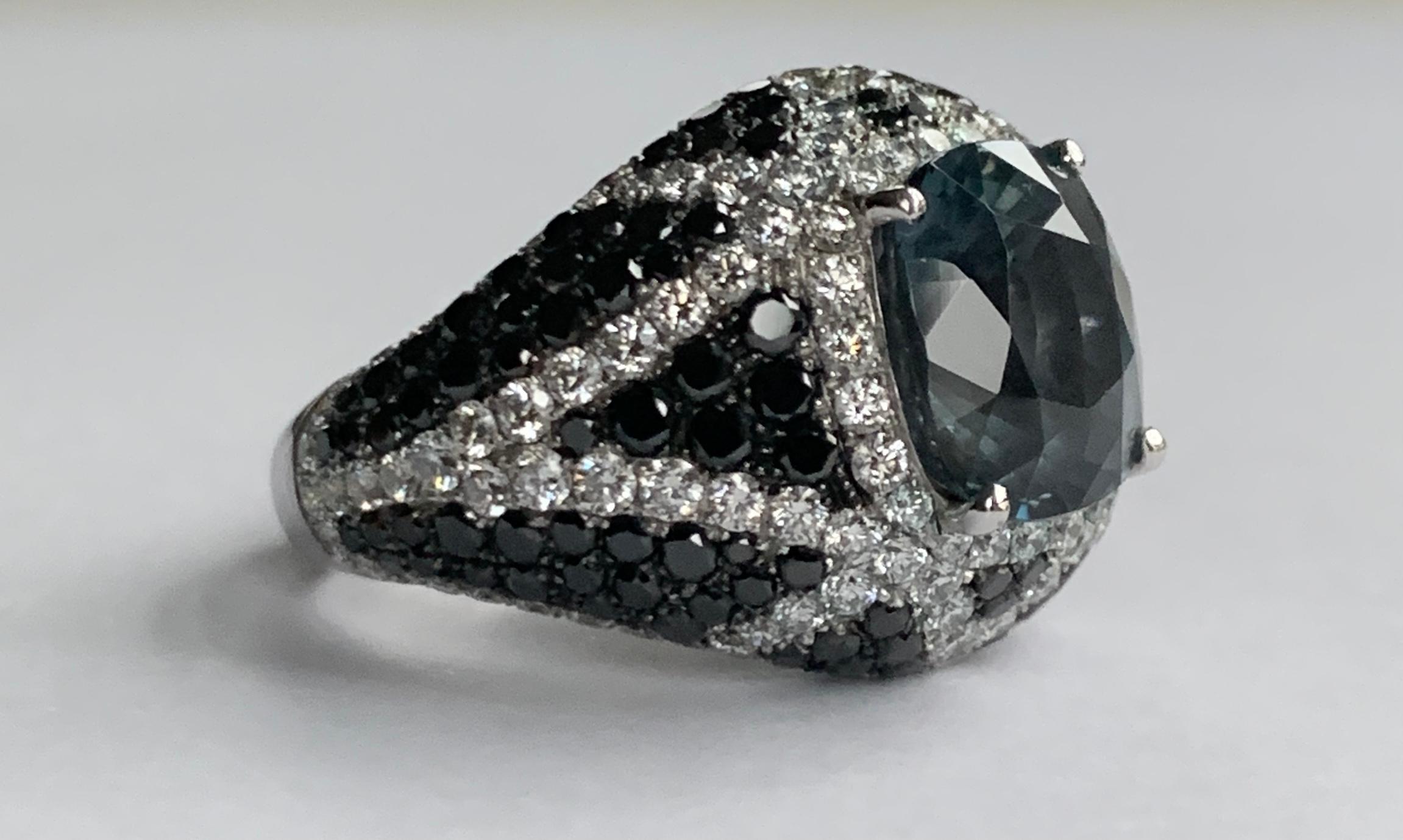 A mesmerising cushion cut blue spinel encircled by a delicate ring of brilliant cut diamonds, surrounded by a glittering pave' of black and white diamonds

Details
Blue Cobalt Spinel Cocktail Ring
- 18 karat White Gold
- 4.57 carat Blue Cobalt