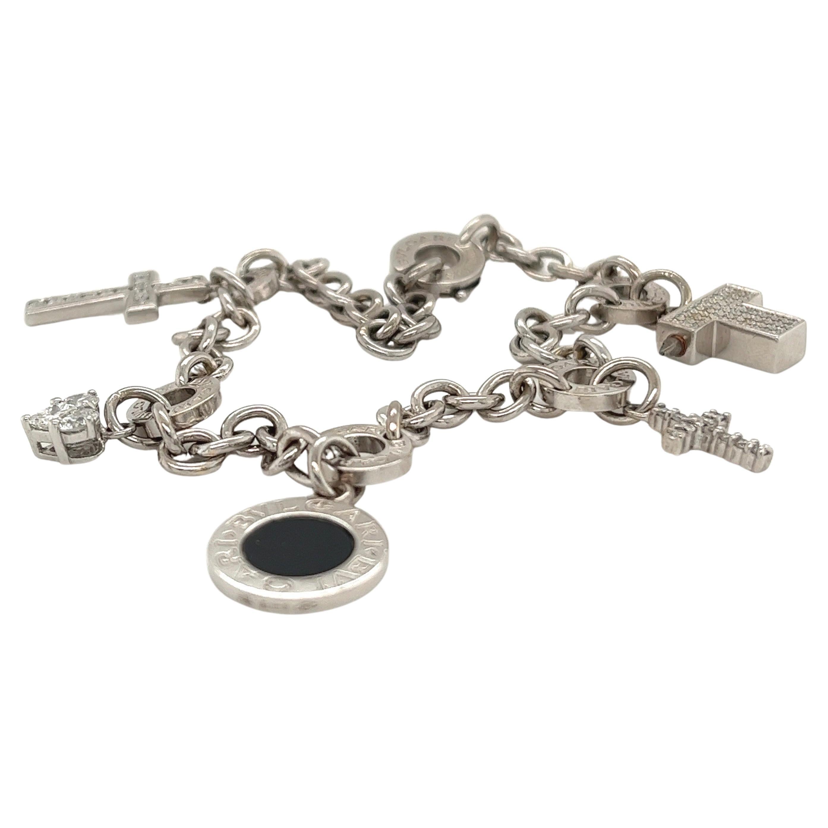 18 Karat White Gold Bvlgari Onyx and Diamond Charm Bracelet For Sale