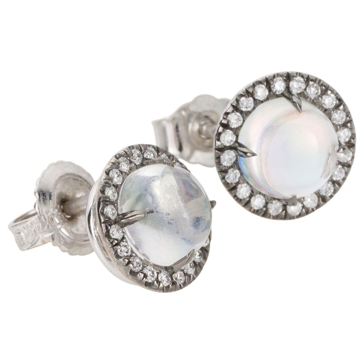 These are so cute, looking for a pair of studs that are great for everyday wear but you want something unique. Look no further than these sweet 18k white gold cabochon moonstone & diamond studs. They feature a beautiful rainbow moonstones that show