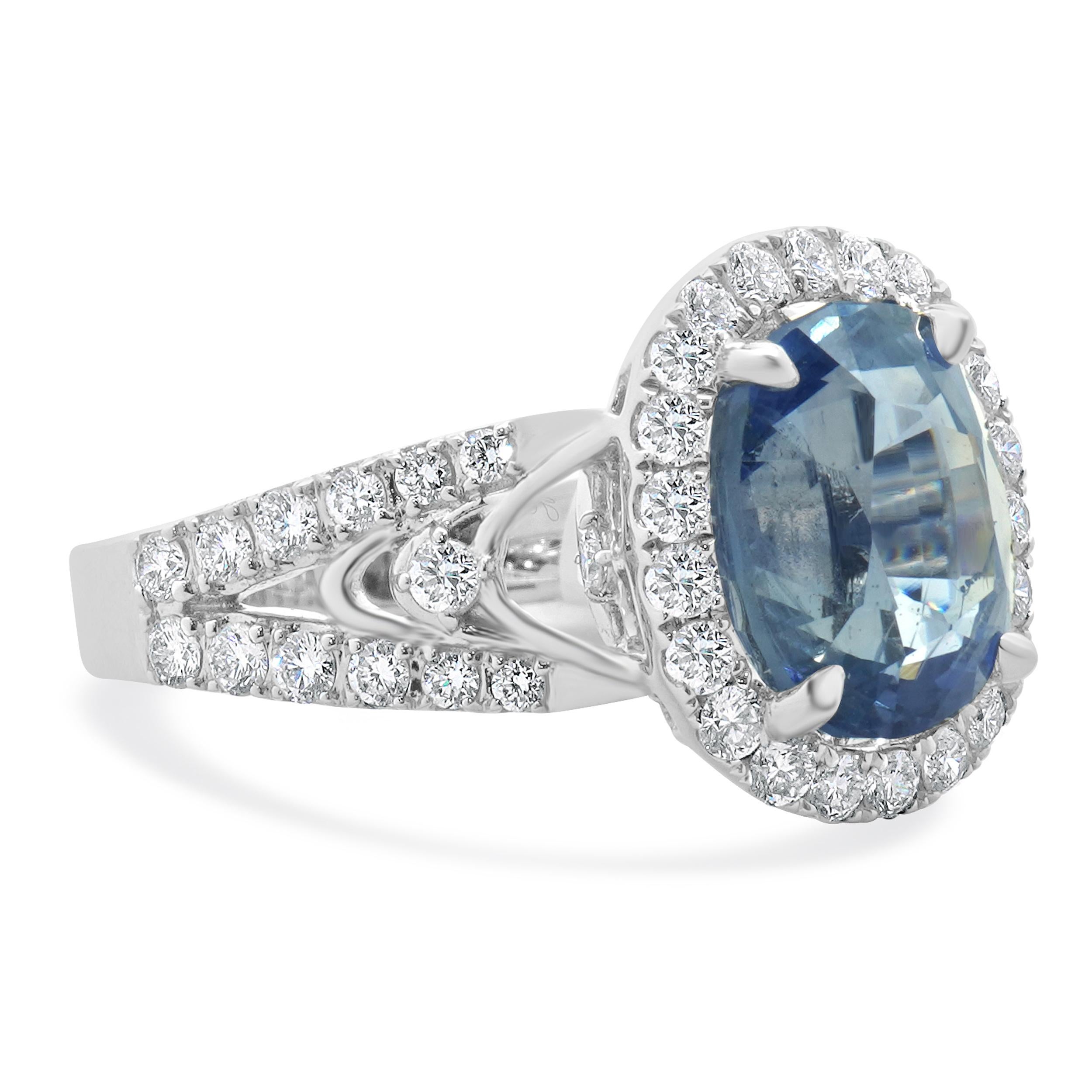 Oval Cut 18 Karat White Gold Ceylon Sapphire and Diamond Ring For Sale
