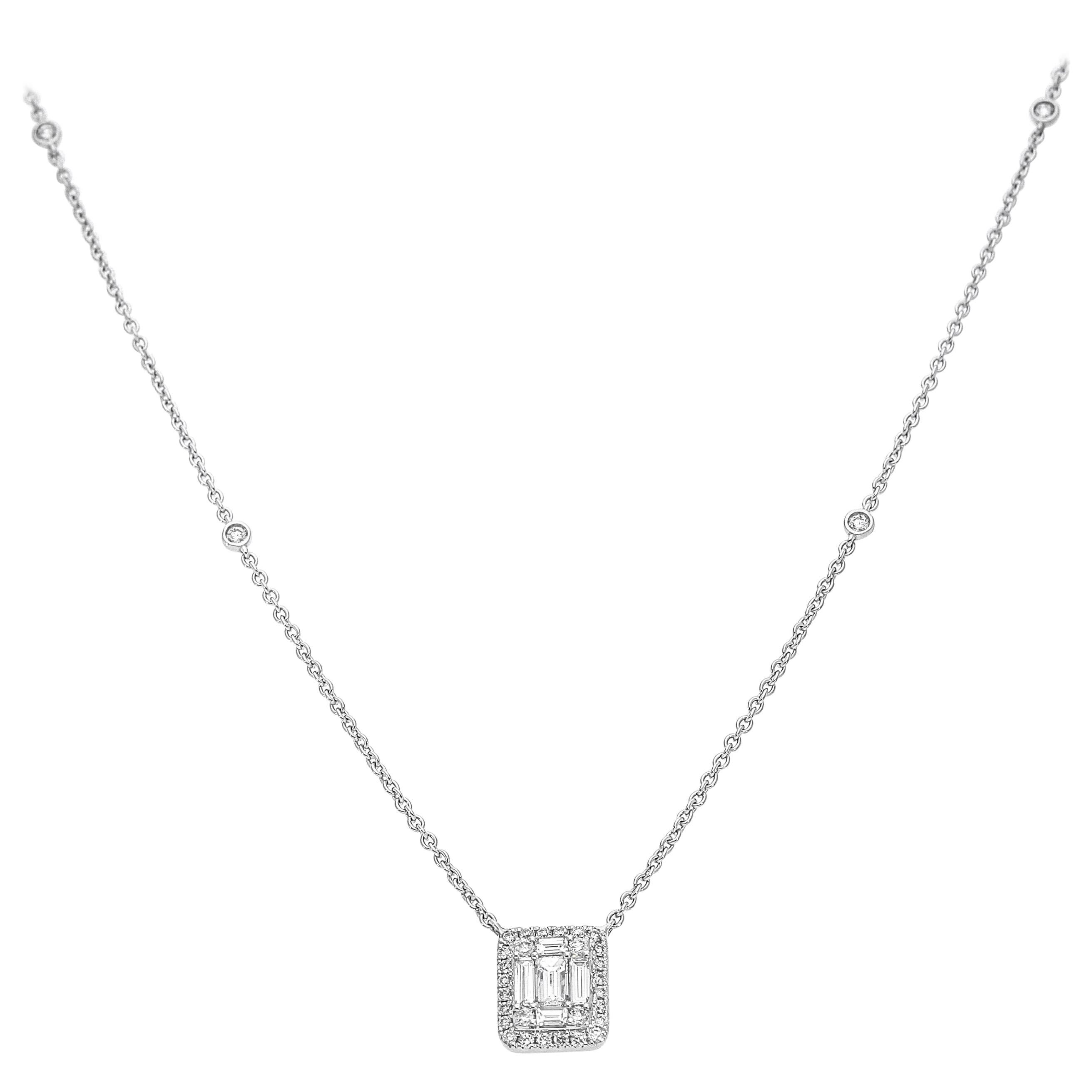 18 karat white gold chain necklace with rectangular pendant diamonds and four round diamonds

The pendant has five baguette cut diamonds and 28 round cut diamonds all around
The chain has four round cut diamonds
Total number of diamonds: