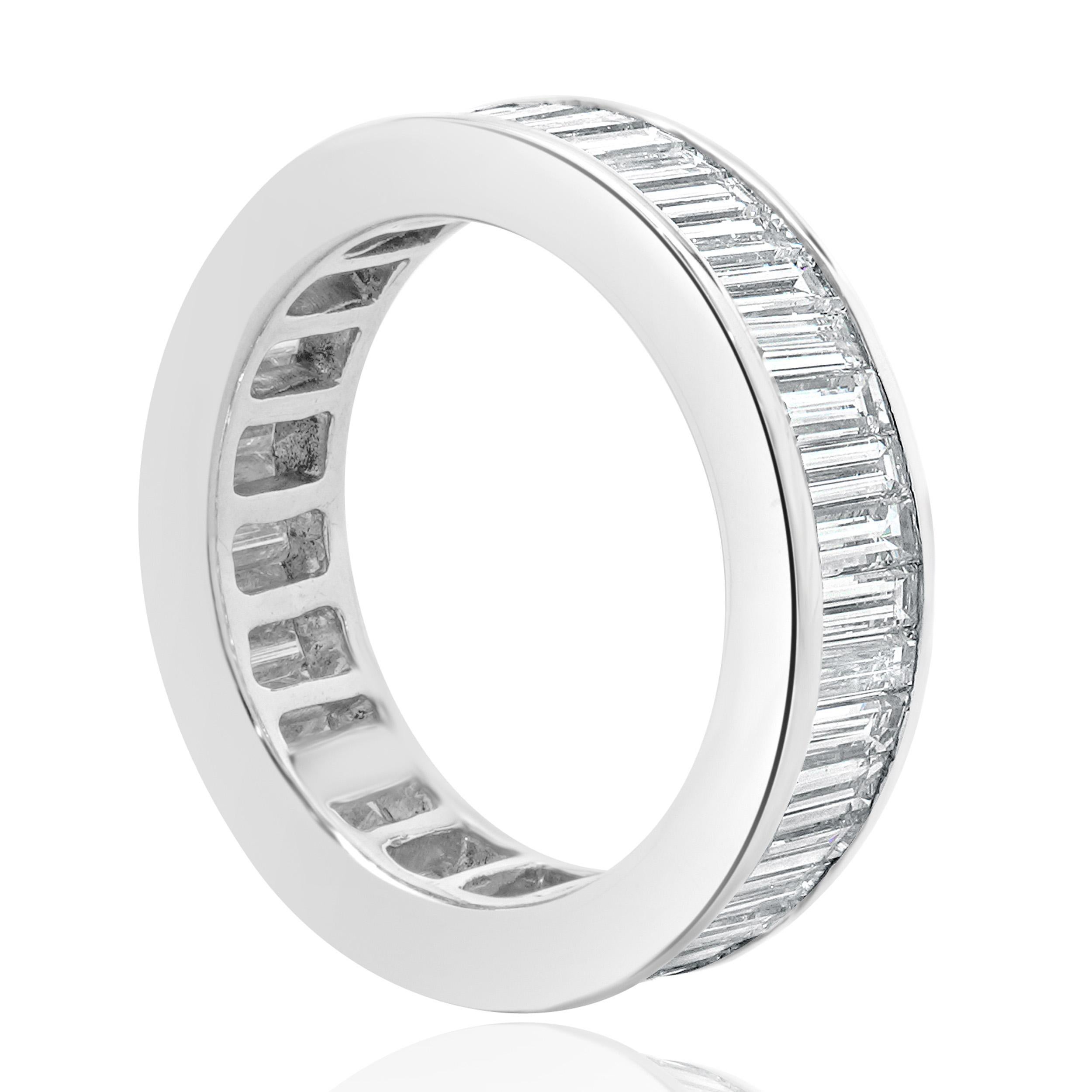 Designer: custom
Material: 18K white gold
Diamond: 45 baguette cut = 3.60cttw
Color: H
Clarity: VS2-SI1
Ring size: 6.75 (please allow two additional shipping days for sizing requests)
Weight: 6.45 grams