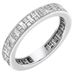 18 Karat White Gold Channel Set Baguette 
Princess Cut Diamond Band