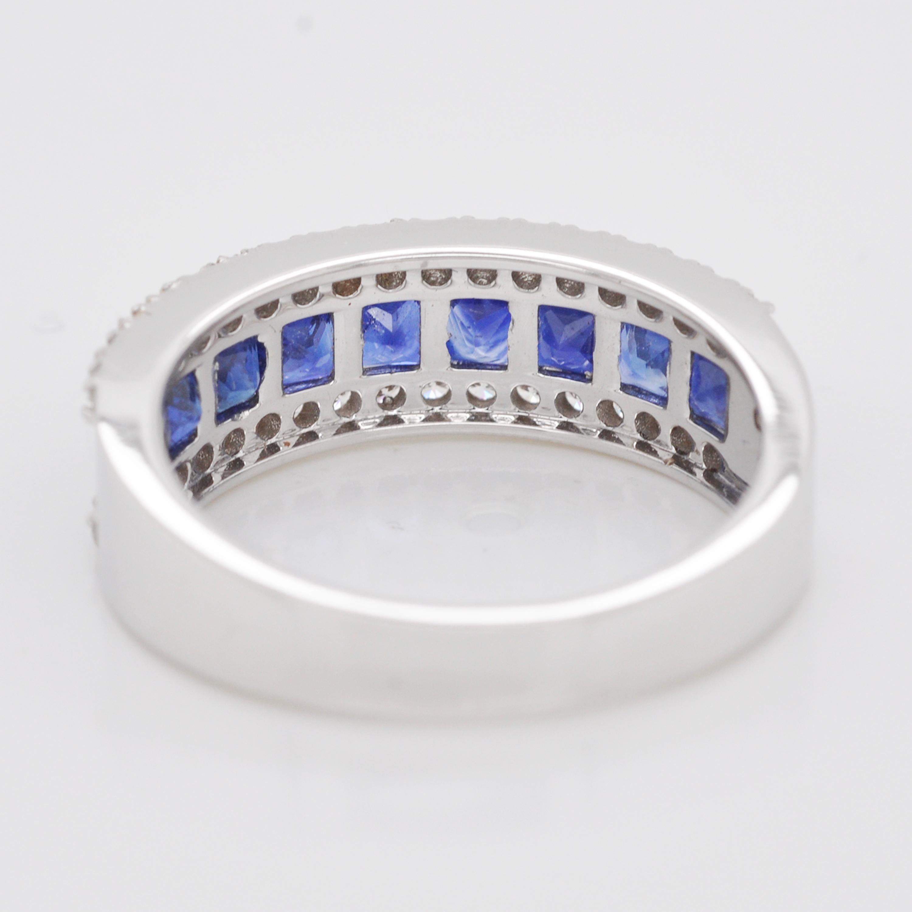 Contemporary 18 Karat White Gold Channel Set Princess Cut Blue Sapphire Diamond Band Ring For Sale