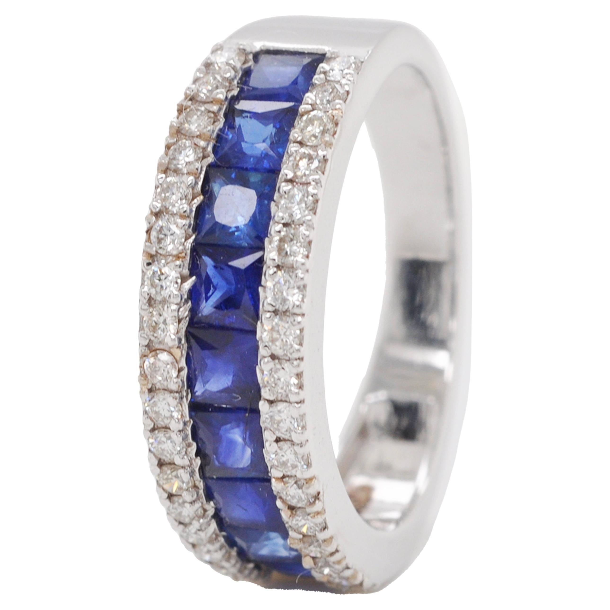 18 Karat White Gold Channel Set Princess Cut Blue Sapphire Diamond Band Ring For Sale