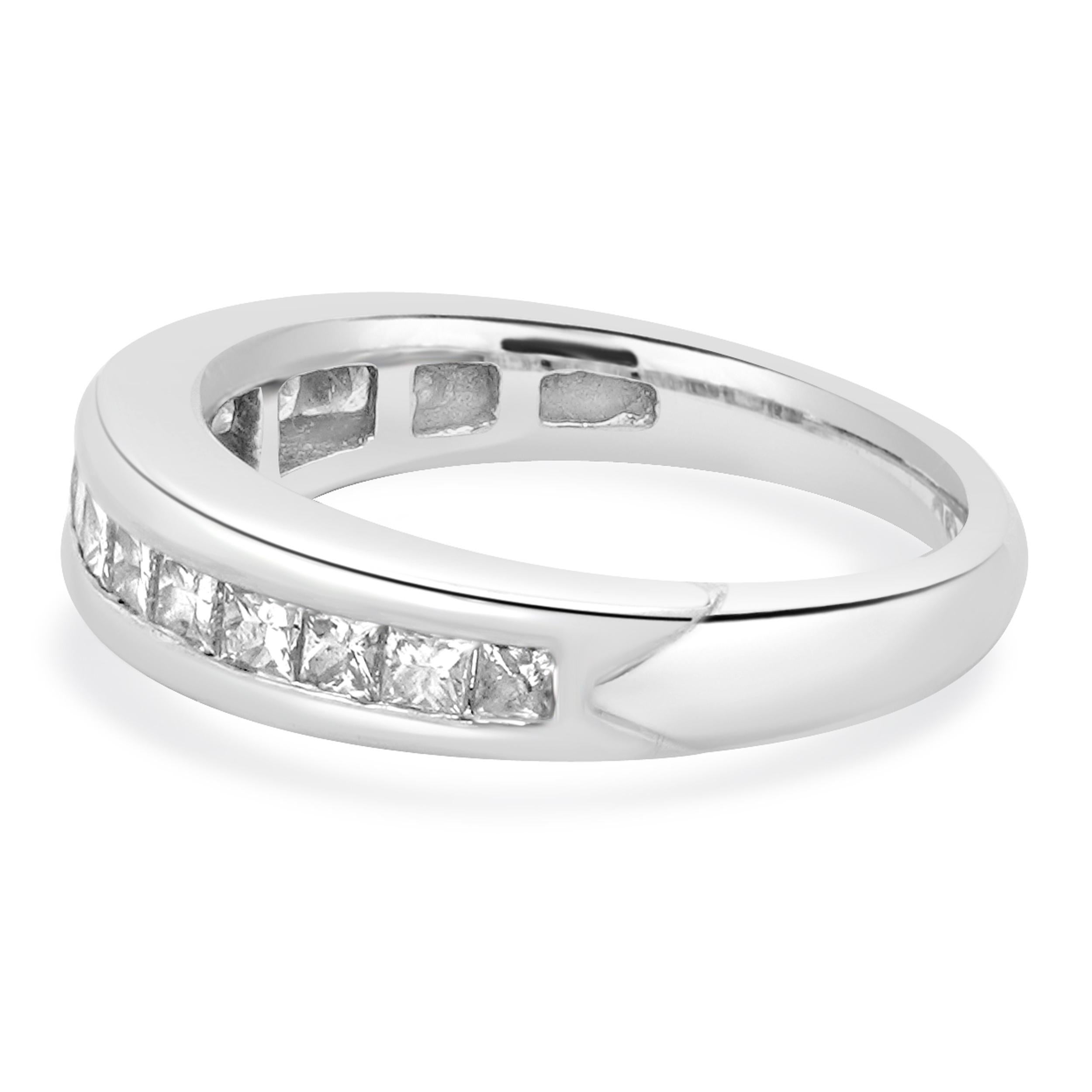Designer: custom
Material: 18K white gold
Diamond: 14 princess cut = 0.70cttw
Color: H
Clarity: SI2
Ring size: 4 (please allow two additional shipping days for sizing requests)
Weight: 3.84 grams