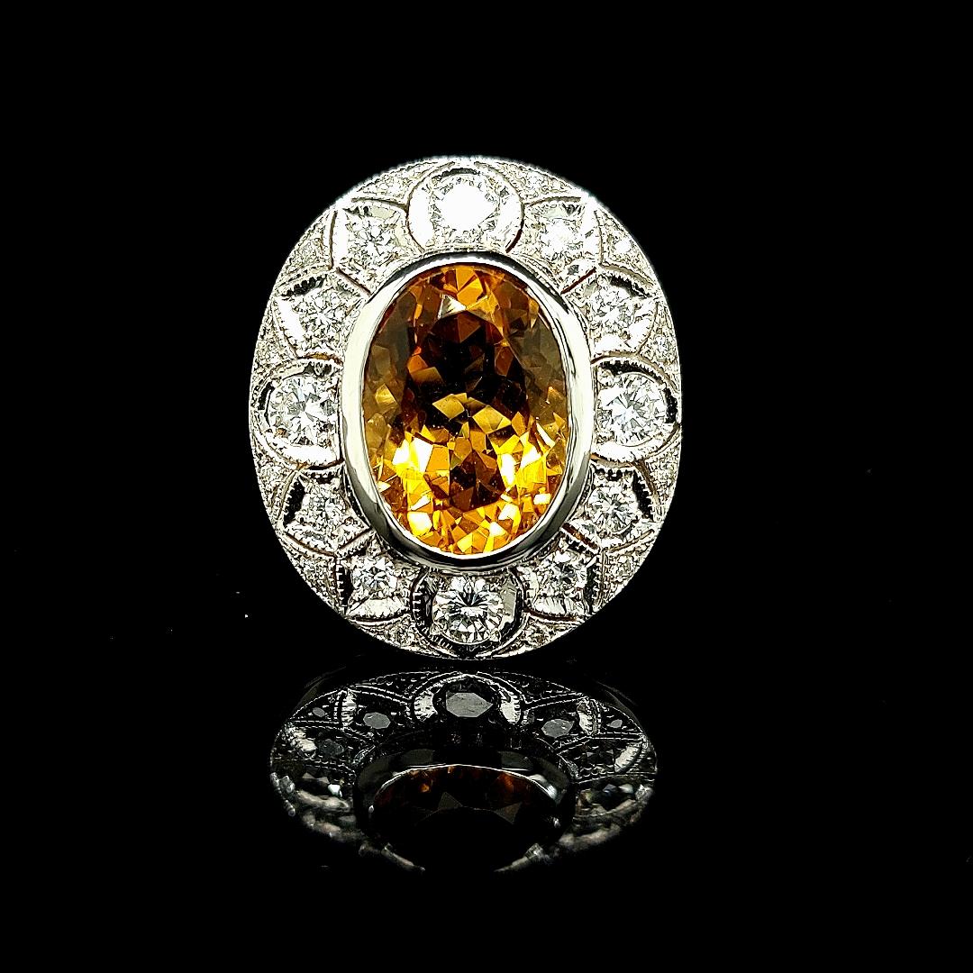 18kt White Gold Citrine & Diamonds Cocktail Ring

Beautiful Citrine ring with very heart warming color set with diamonds around.

The Citrine stone has a warmer and intenser color we have been able to show on picture.

Diamonds: 12 diamonds ,   1,16