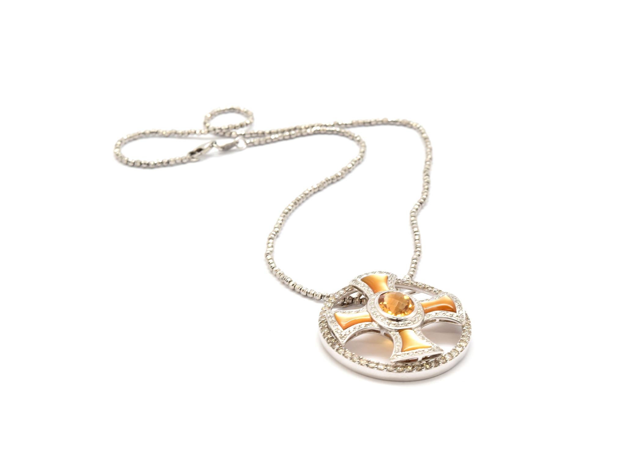 Contemporary and chic! This unique necklace has a gorgeous orange citrine stone at its center. The citrine measures 8x10mm. Stemming for the citrine are 4 bars of orange mother of pearl. The citrine and mother of pearl are all surrounded by gorgeous