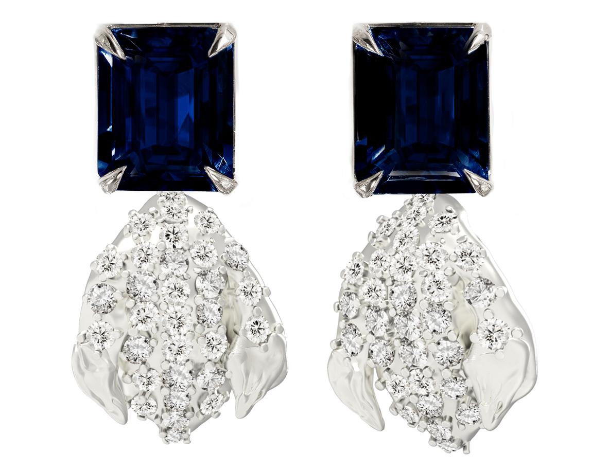 These contemporary Snowflower spring floral clip-on dangle earrings are in 18 karat white gold with 62 round natural diamonds, VS, F-G, and sapphire, octagon cut, 4,5 carats in total. The sculptural design adds the extra highlights to the surface of