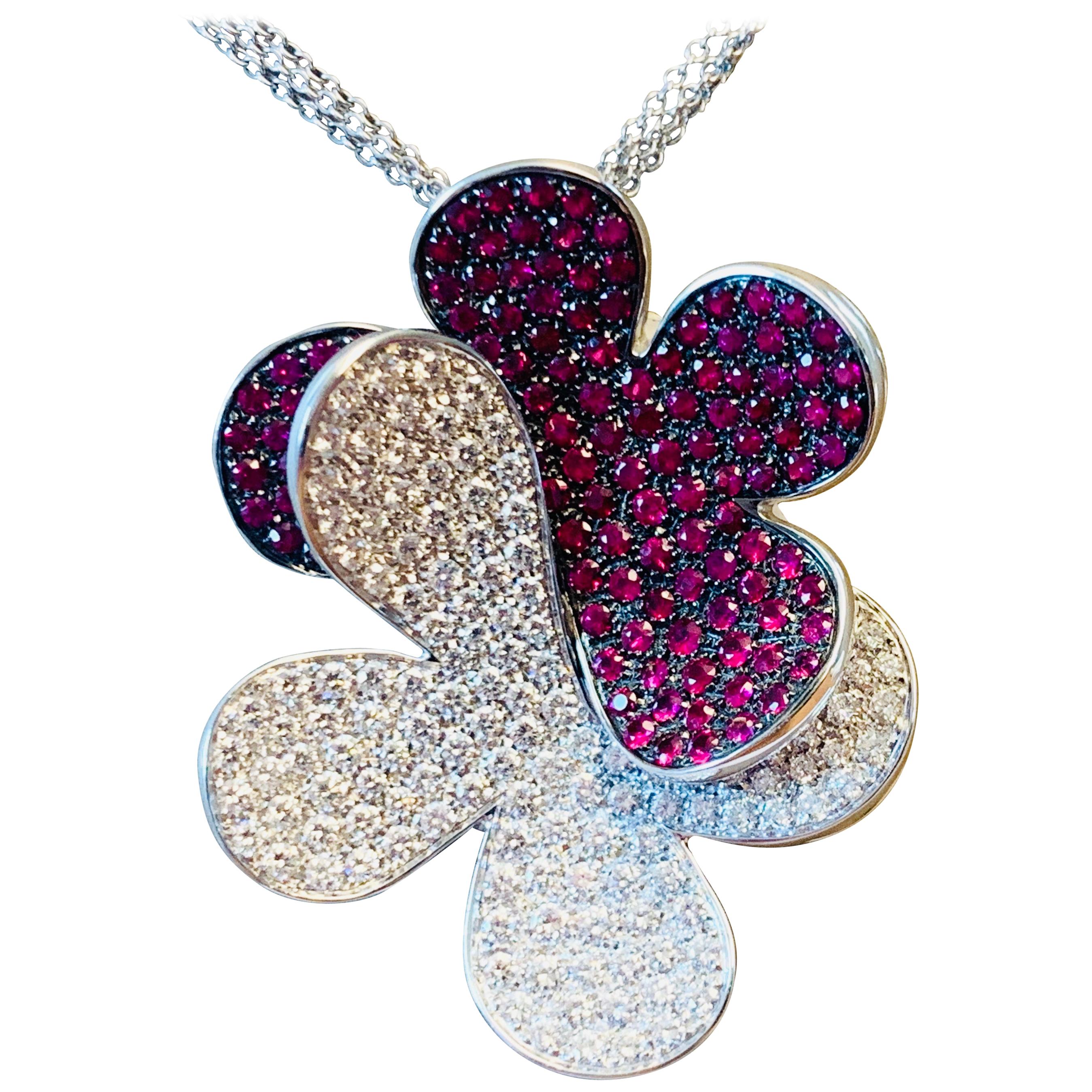 18 Karat White Gold Clover Leaf Ruby and Diamond Pendant with Chain by Salavetti For Sale