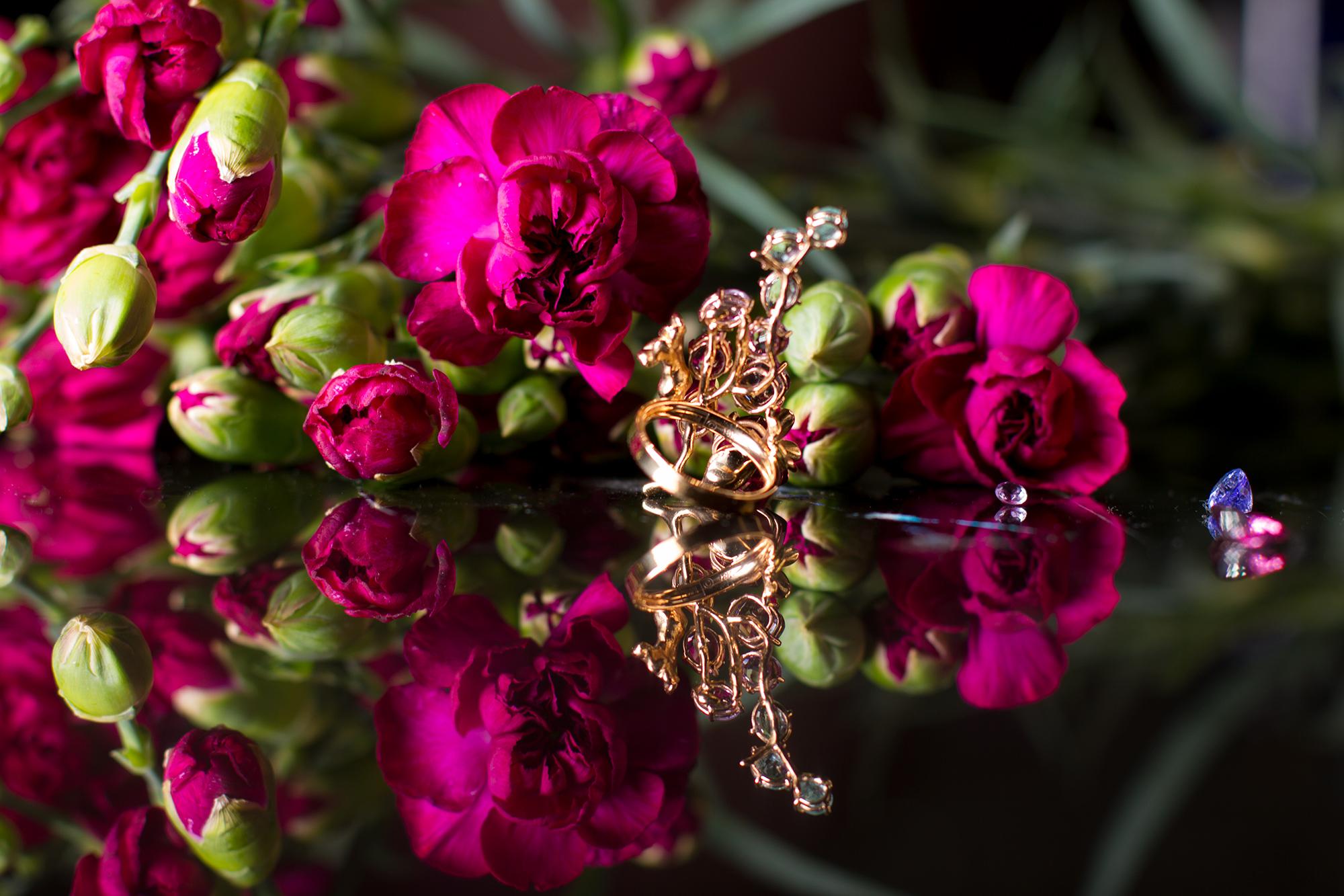 Eighteen Karat White Gold Ring with Pink Sapphires and Paraiba Tourmalines 10