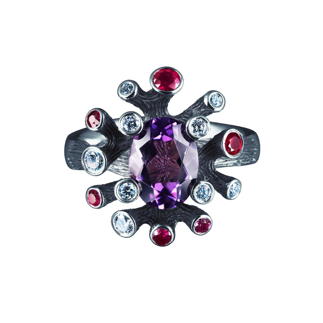 - 10 Round Diamonds - 0.20 ct, G/ VVS
- 6 Rubies - 0.23 ct
- 1 Amethyst - 1.15 ct
- 18K White Gold 
- Weight: 7.59 g
- Size: 17 mm
This elegant ring from the Coral collection of Jewelry Theater features a beautiful 1.15 ct amethyst, surrounded with