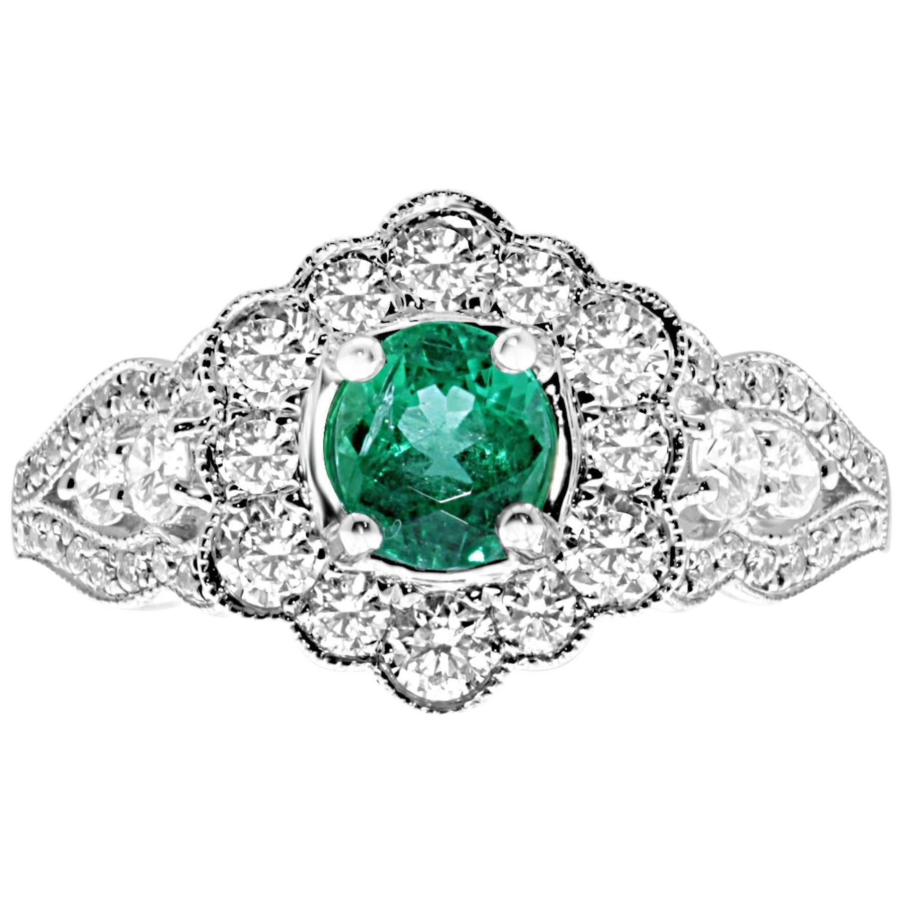 18 Karat White Gold Colombian Emerald and Diamonds Flower Vintage Style Ring For Sale