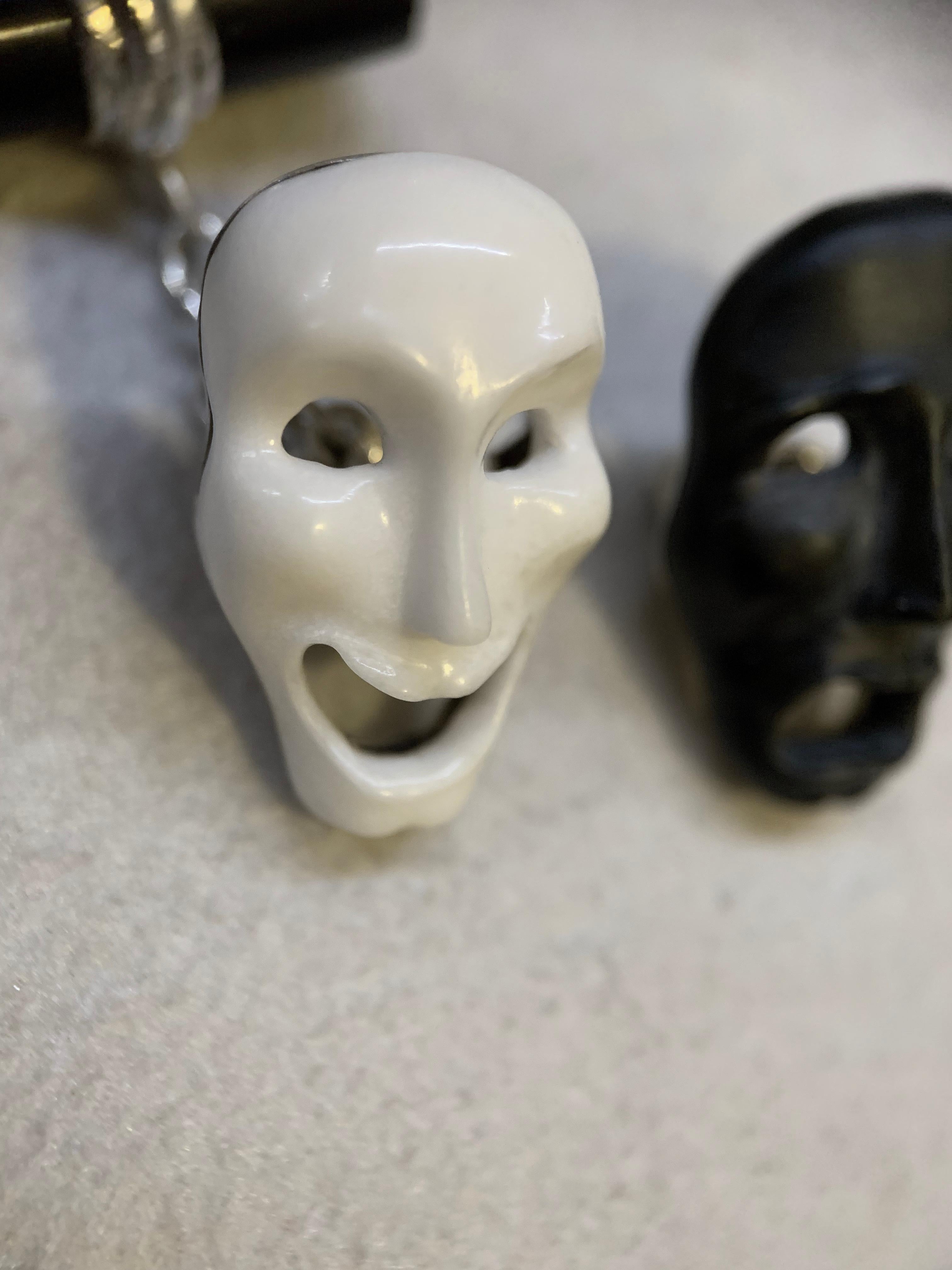 Comedy and Tragedy theater masks cufflinks totally hand carved , made in white agate and black onyx.
Mounting in 18 karat white gold.

Alterations can be made in Yellow or White Gold.
The bars variations are Onyx, White Agate, Lapis Lazuli, Mother
