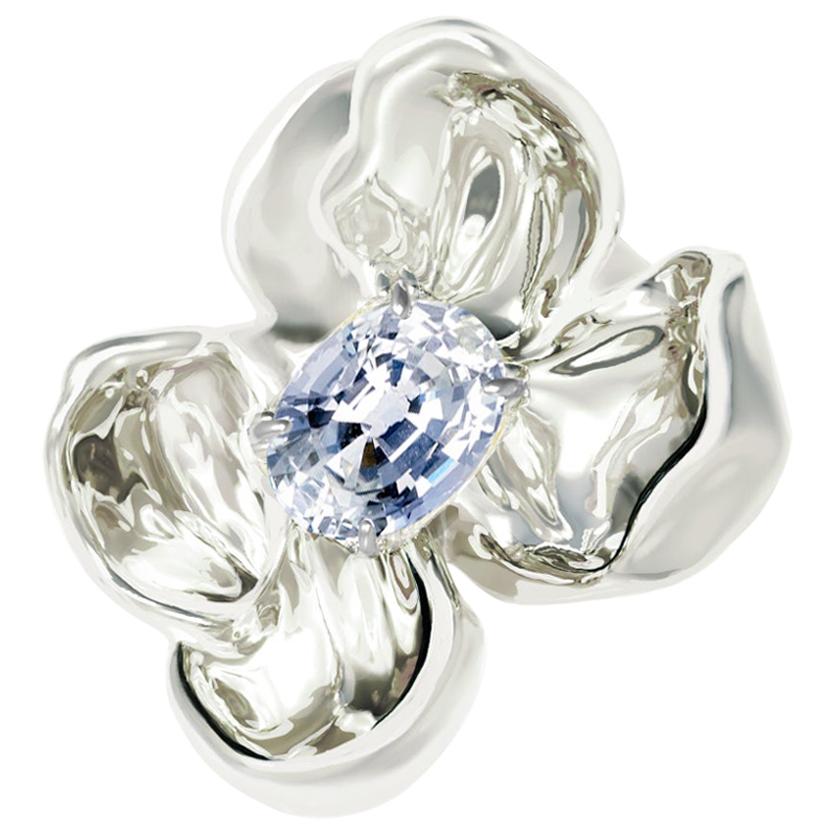 Eighteen Karat White Gold Contemporary Brooch with Light Blue Sapphire For Sale