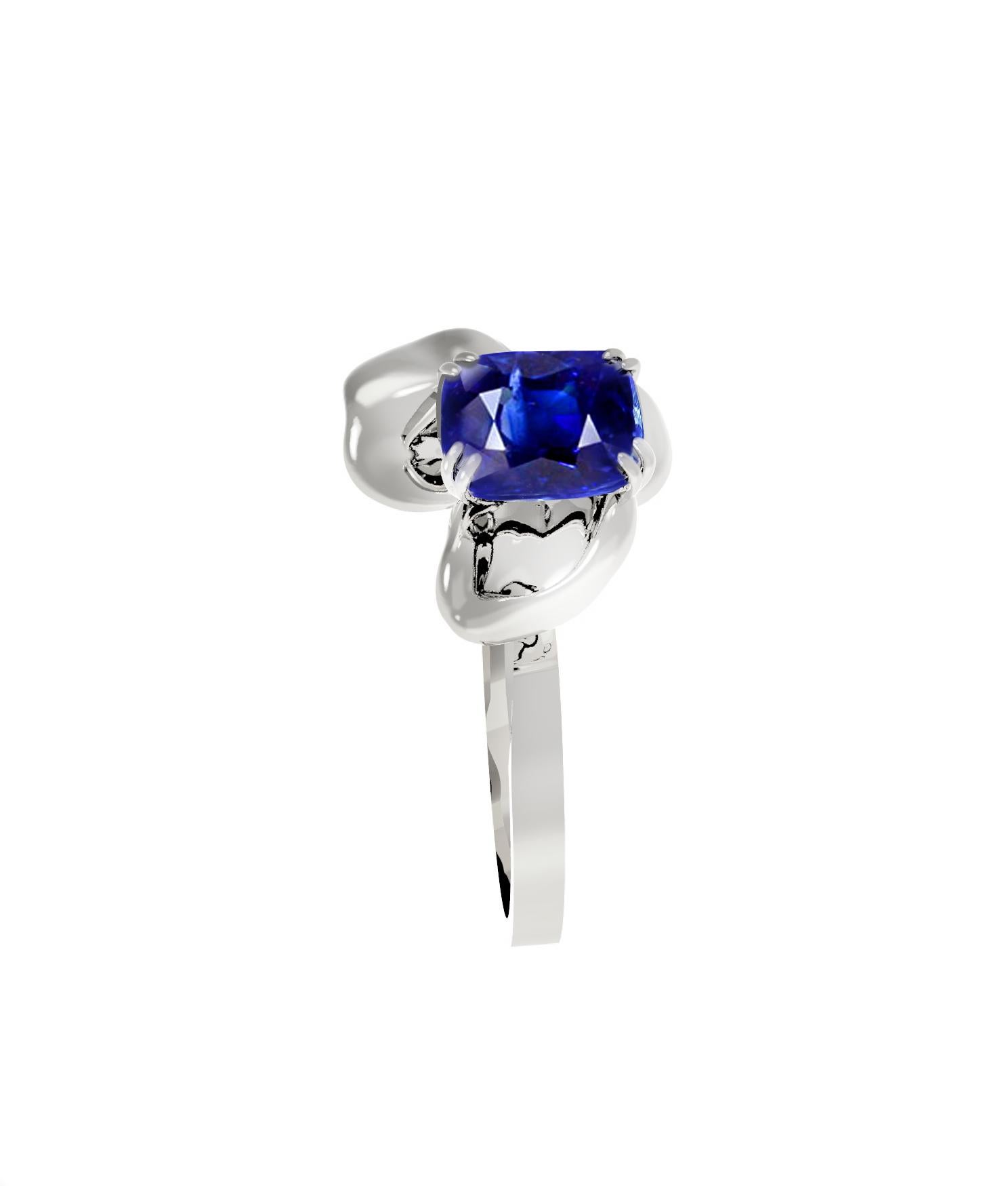 Women's Eighteen Karat White Gold Contemporary Ring with Two Carats Cushion Sapphire For Sale
