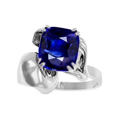 Eighteen Karat White Gold Contemporary Ring with Two Carats Cushion Sapphire