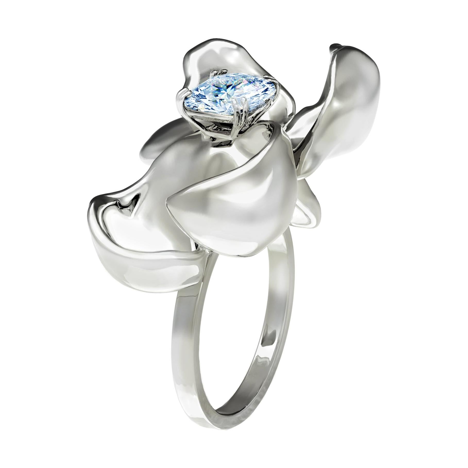 Eighteen Karat White Gold Contemporary Engagement Ring with Light Sapphire