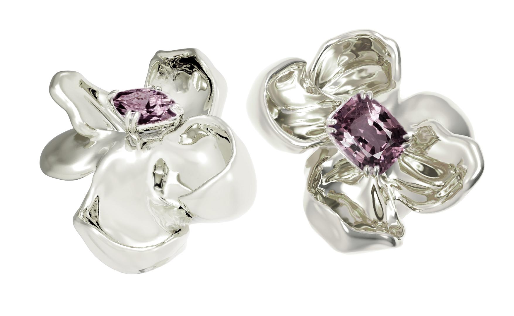 These Magnolia Flower contemporary clip-on earrings are in 18 karat white gold with storm purple cushion spinels (about 3 Cts in total). The tender water-surface of the spinel multiplies the light, mirroring on the golden petals. 

The piece is