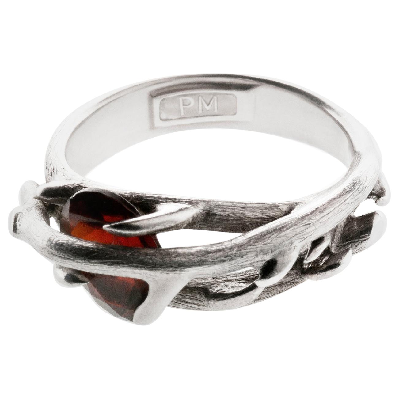Eighteen Karat White Gold Contemporary Ring by the Artist with Garnet For Sale