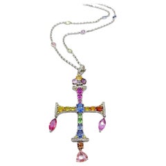 18 Karat White Gold Cross with Diamonds and 17.43 Carat Multicolored Sapphires