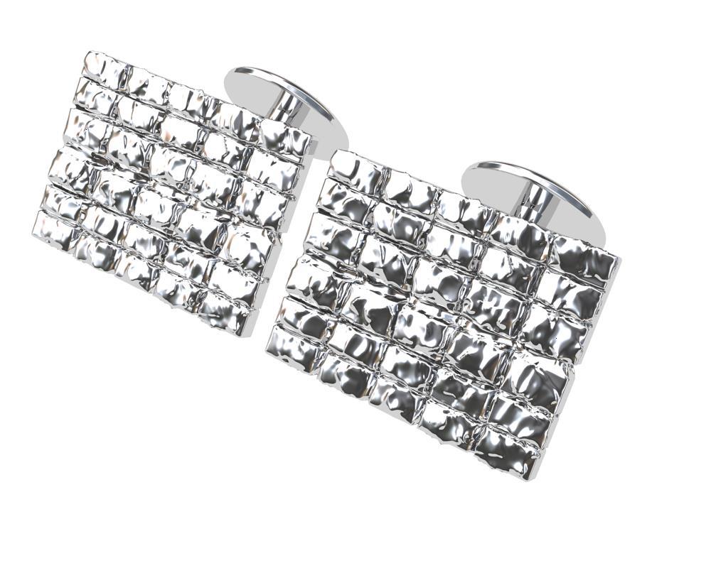   18k White Gold  Molten Rectangle Cufflinks, This design is inspired by the liquid look of gold as its melting under the torch, without losing the rectangles shape.  Symmetrical design, but saved before destruction. High Polished 18k white .These