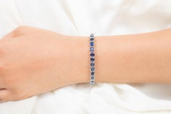 18 Karat White Gold 19.15 Carat Dark Blue Sapphire Tennis Bracelet