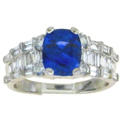 18 Karat White Gold Cushion Cut Blue Sapphire and Diamond Ring