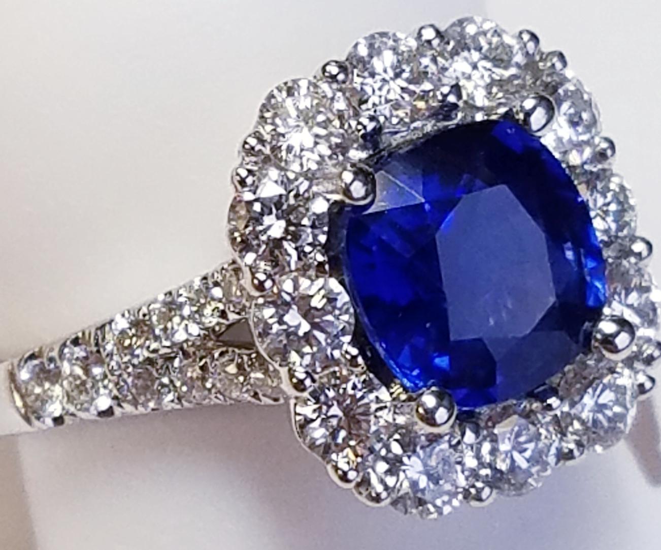 18k White Gold Cushion Cut Sapphire and Diamond Ring
1.92 carats of Sapphires
1.05 carats of Diamonds
Cushion Cut
18k white gold 