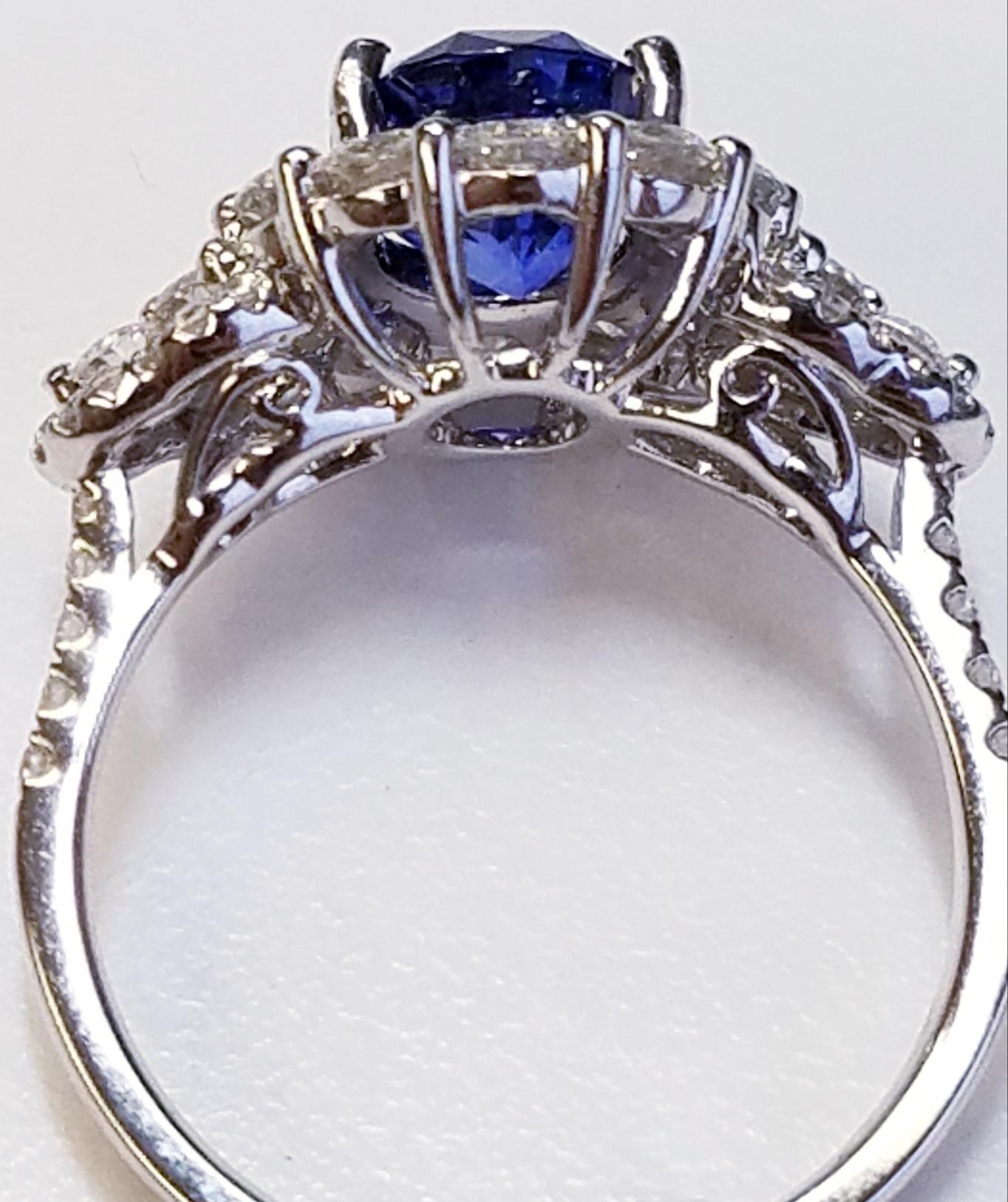 Women's or Men's 18 Karat White Gold Cushion Cut Sapphire and Diamond Ring