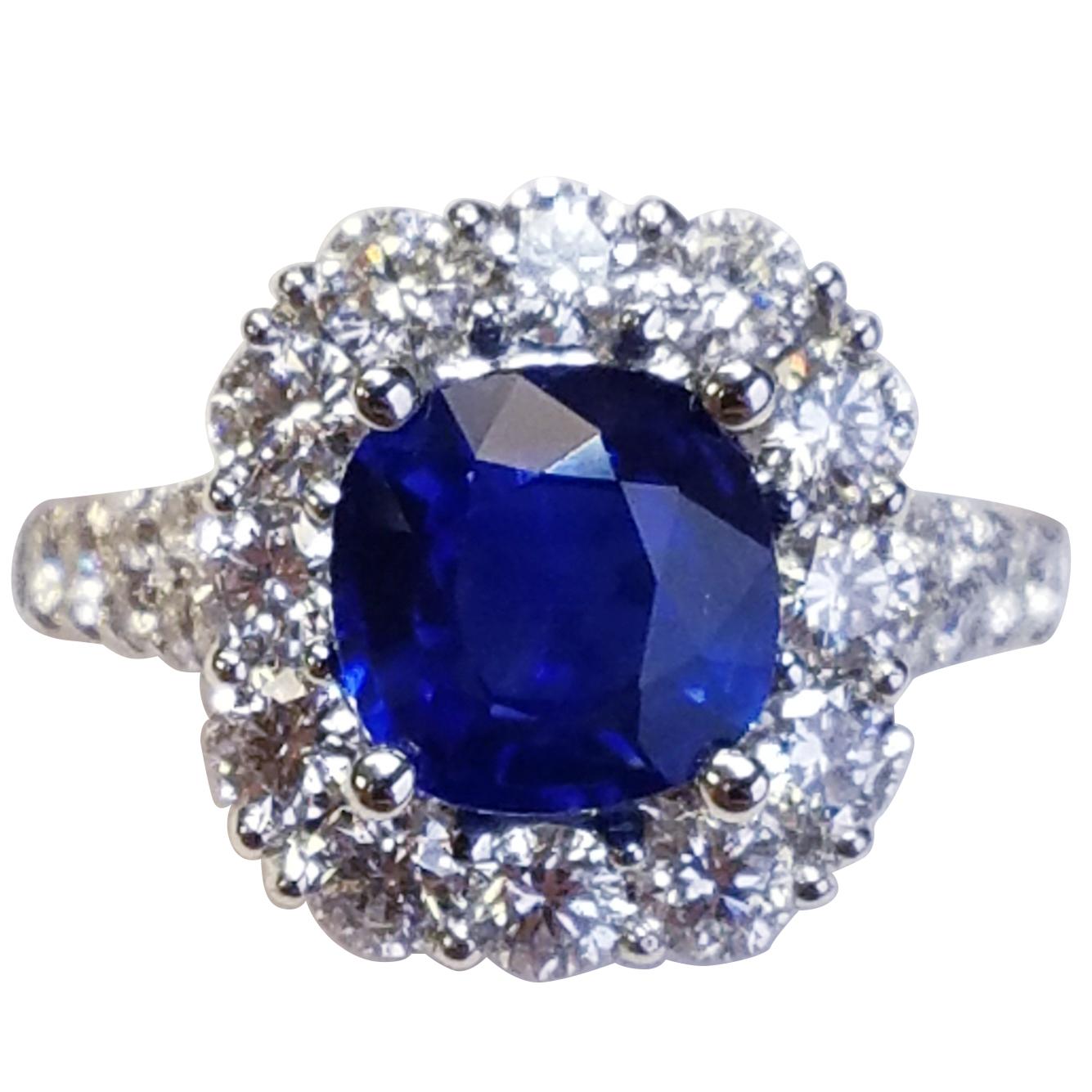 18 Karat White Gold Cushion Cut Sapphire and Diamond Ring