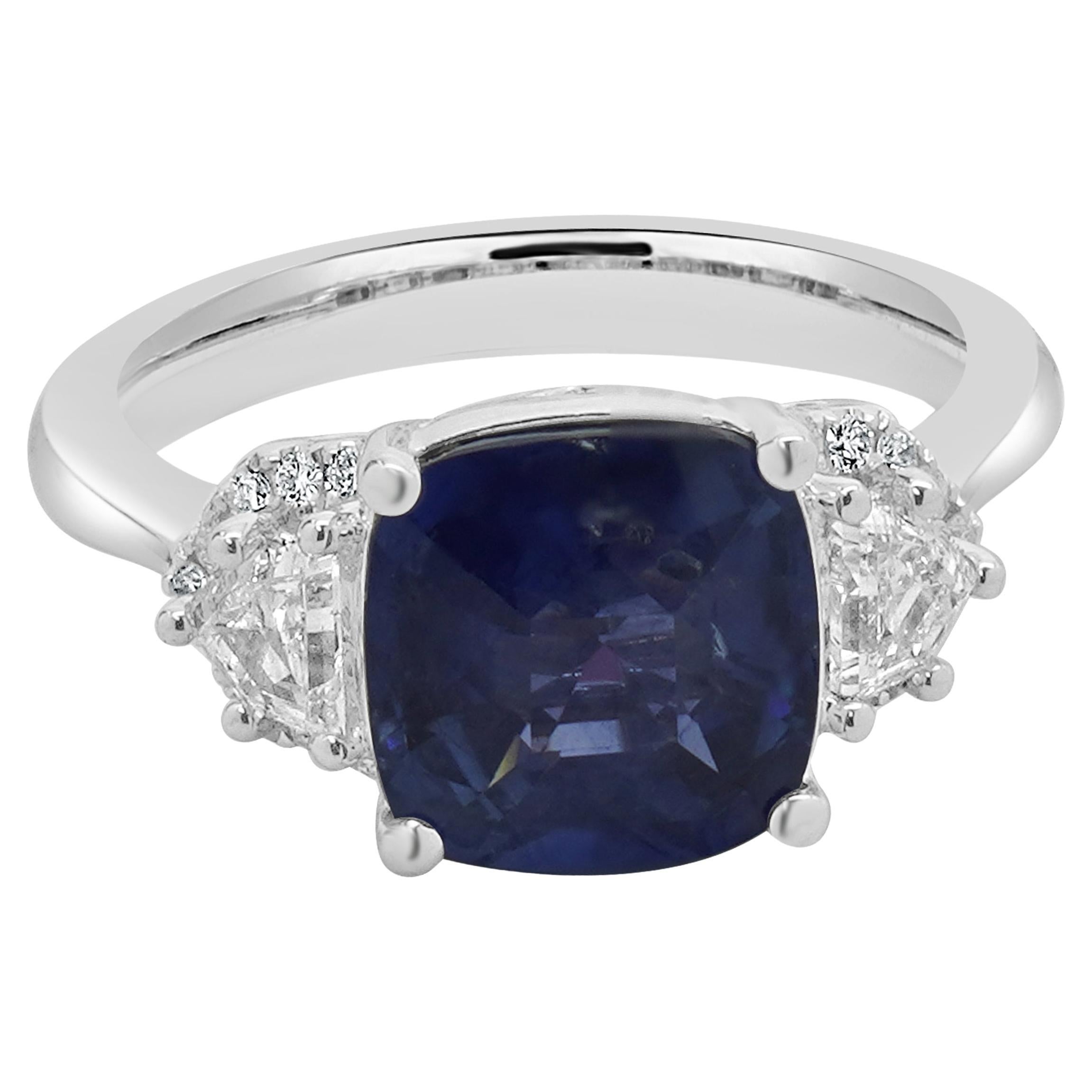 18 Karat White Gold Cushion Cut Sapphire and Diamond Ring