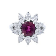 18 Karat White Gold Cushion Ruby Pear Cut Diamonds Flower Ring