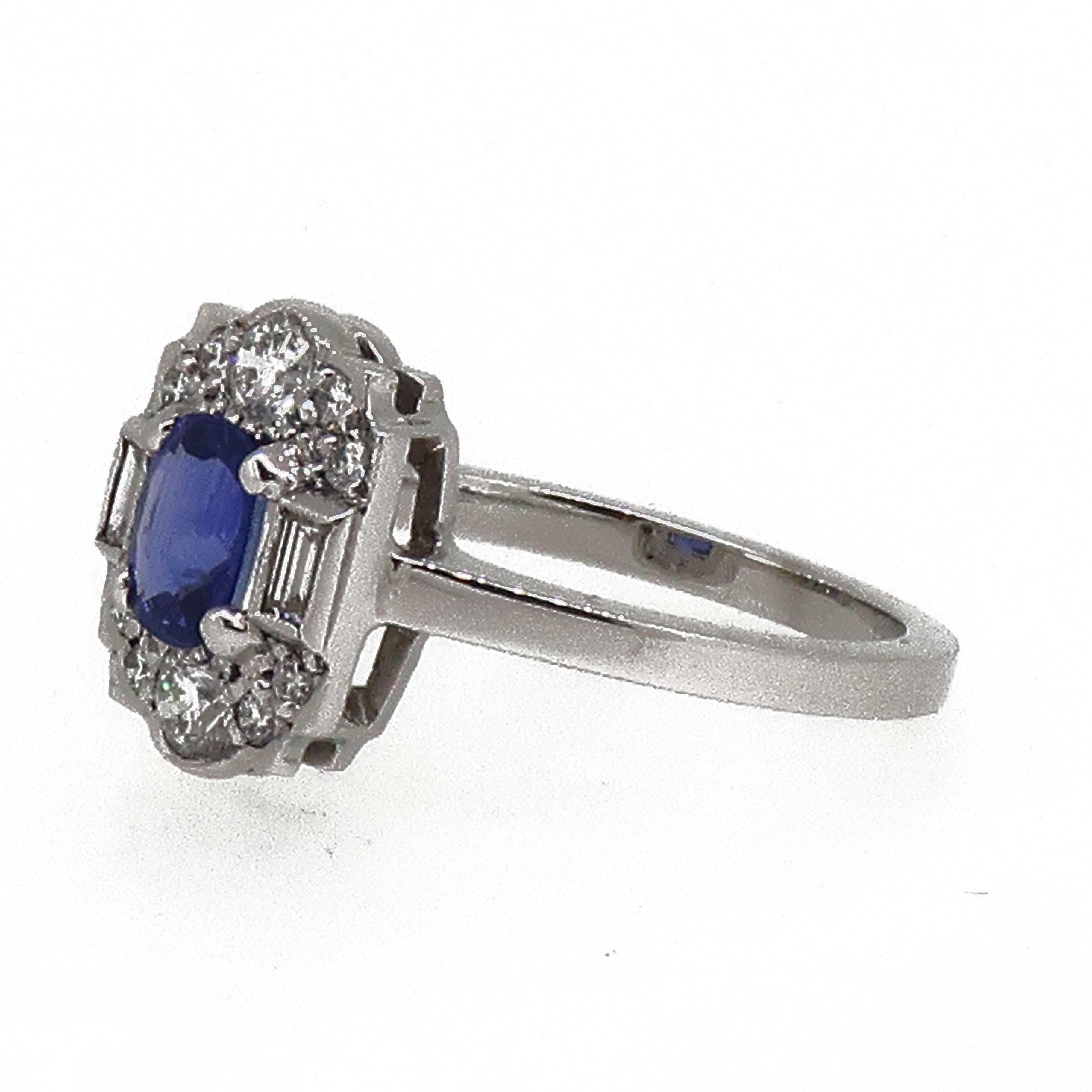 18 Karat Gold Cushion Sapphire & Diamond Art Deco Style Cluster Ring

A royal blue cushion cut sapphire, weighing 0.67ct. This lustrous ring consists of baguette cut and brilliant cut diamonds, typical of the art deco era. Central sapphire is set in