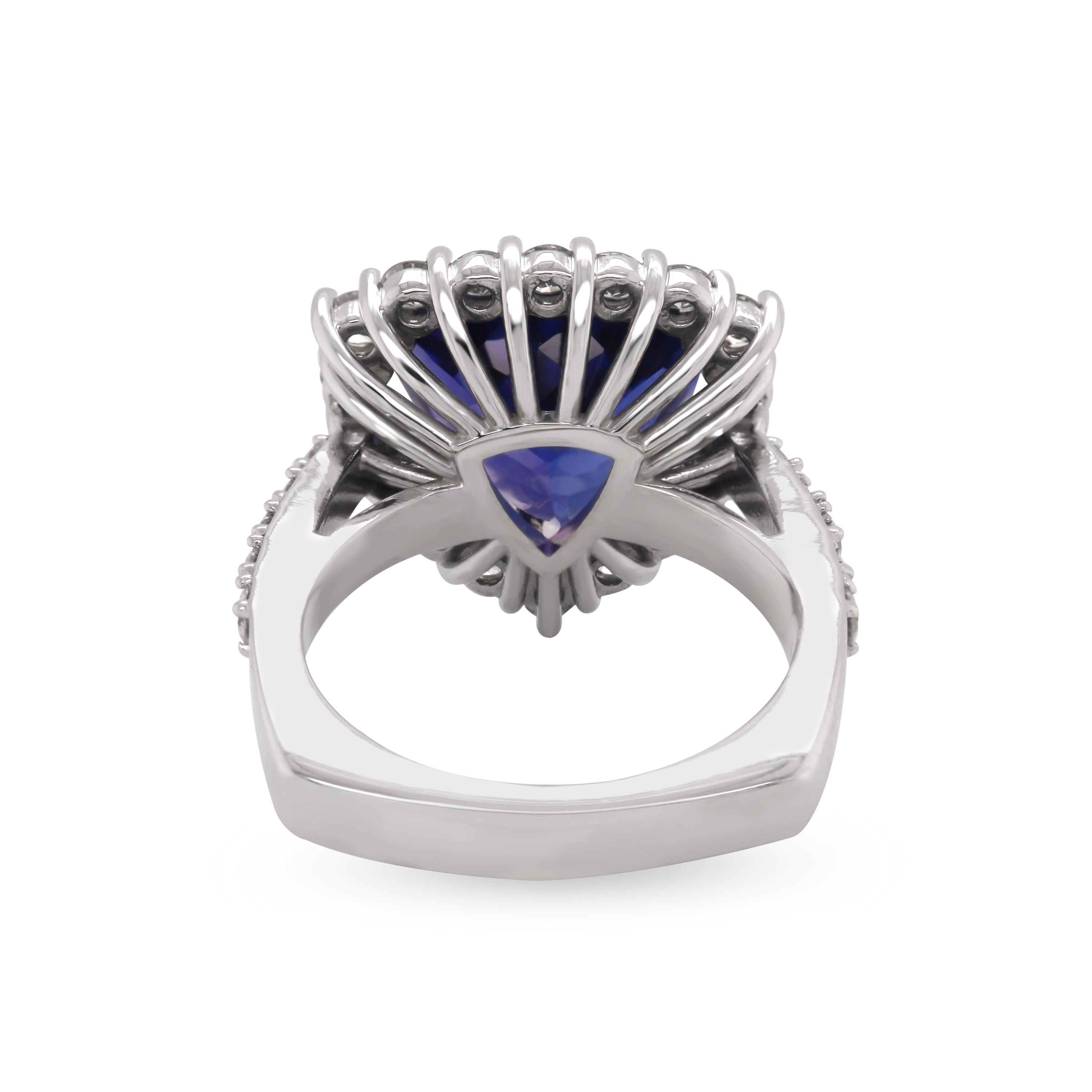 18 Karat White Gold Diamond 6.70 Carat Trillion Cut Tanzanite Cocktail Ring

This one-of-a-kind ring features a trillion-cut Tanzanite center with diamonds surrounding the center stone along with half way across the band.

6.70 carat Tanzanite