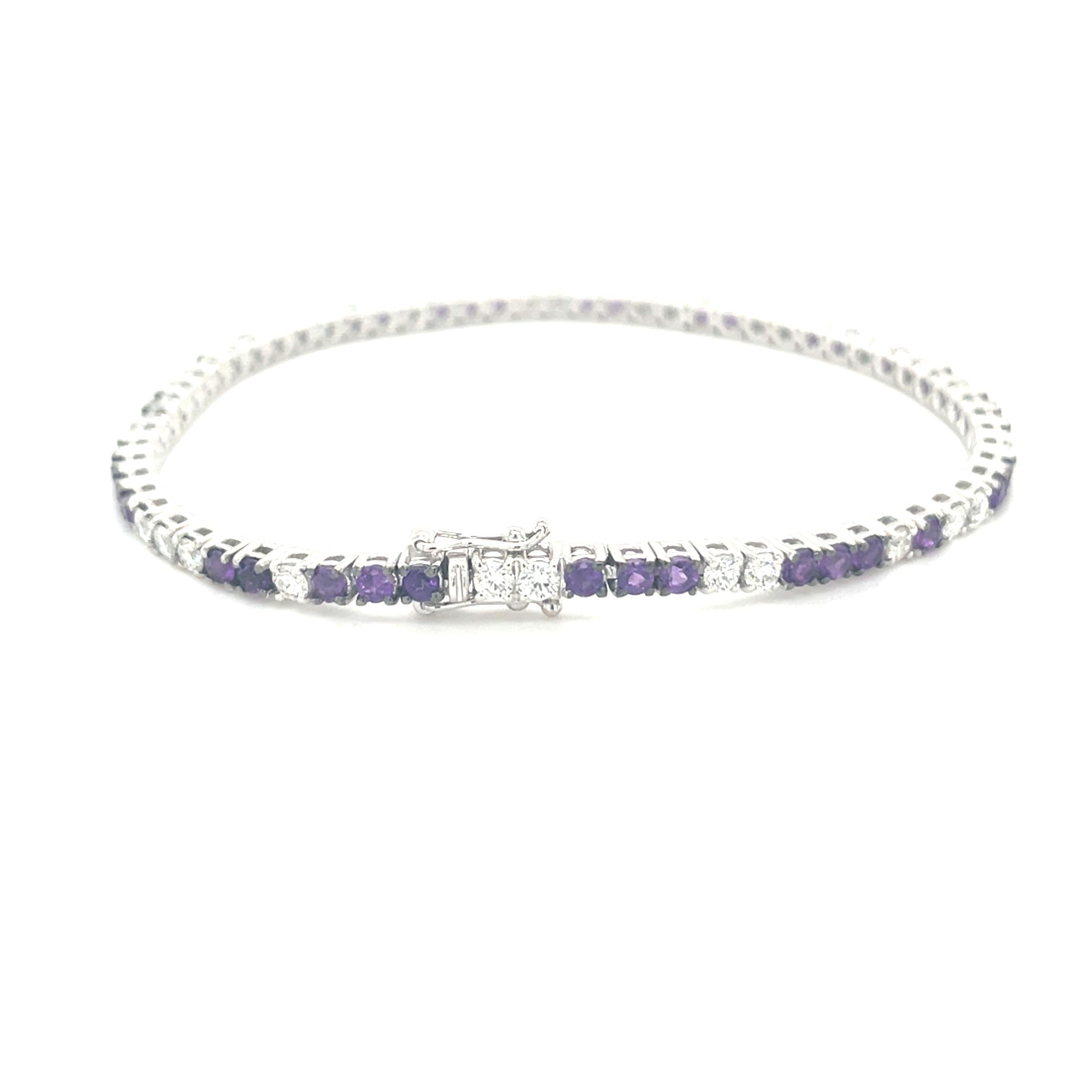 18K white gold bracelet is from our Timeless collection. This beautiful bracelet is created from natural diamonds in G color and VS2 clarity in total of 1.44 Carat and amethysts in total of 1.99 Carat. Total metal weight is 9.11 gr. The bracelet is