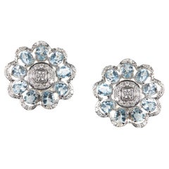 Boucles d'oreilles en or blanc 18 carats avec diamants et aigue-marine