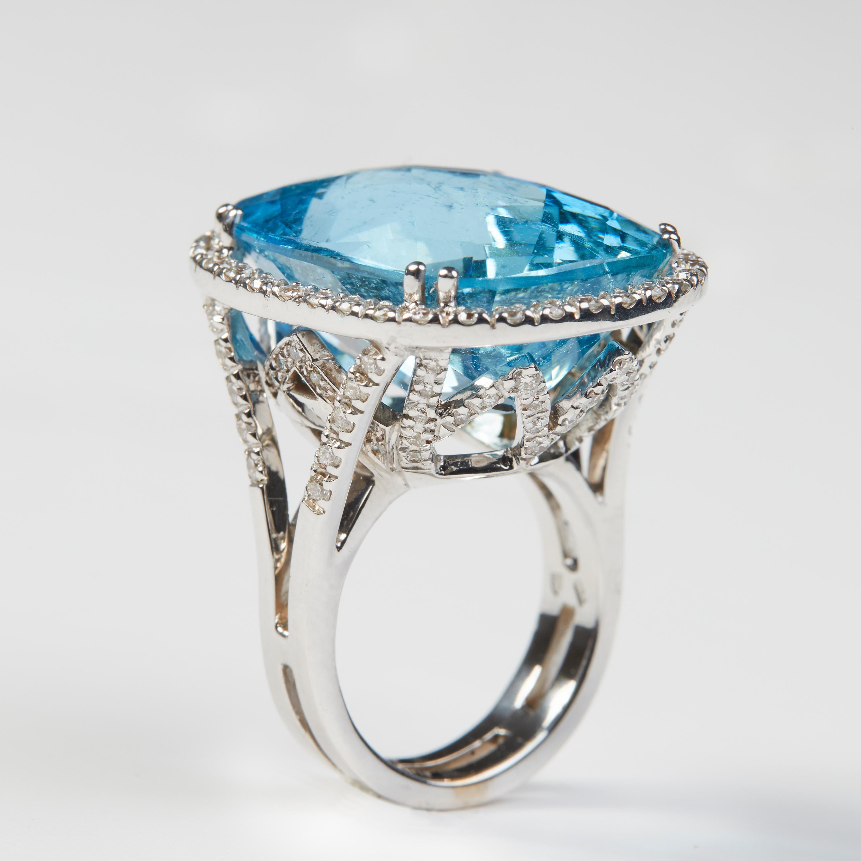 18 Karat White Gold Diamond and Aquamarine Ring

69 Diamonds 1.16  Carat
1 Aquamarine 31.20 carat



Size EU 53 US 6


Founded in 1974, Gianni Lazzaro is a family-owned jewelery company based out of Düsseldorf, Germany.
Although rooted in Germany,
