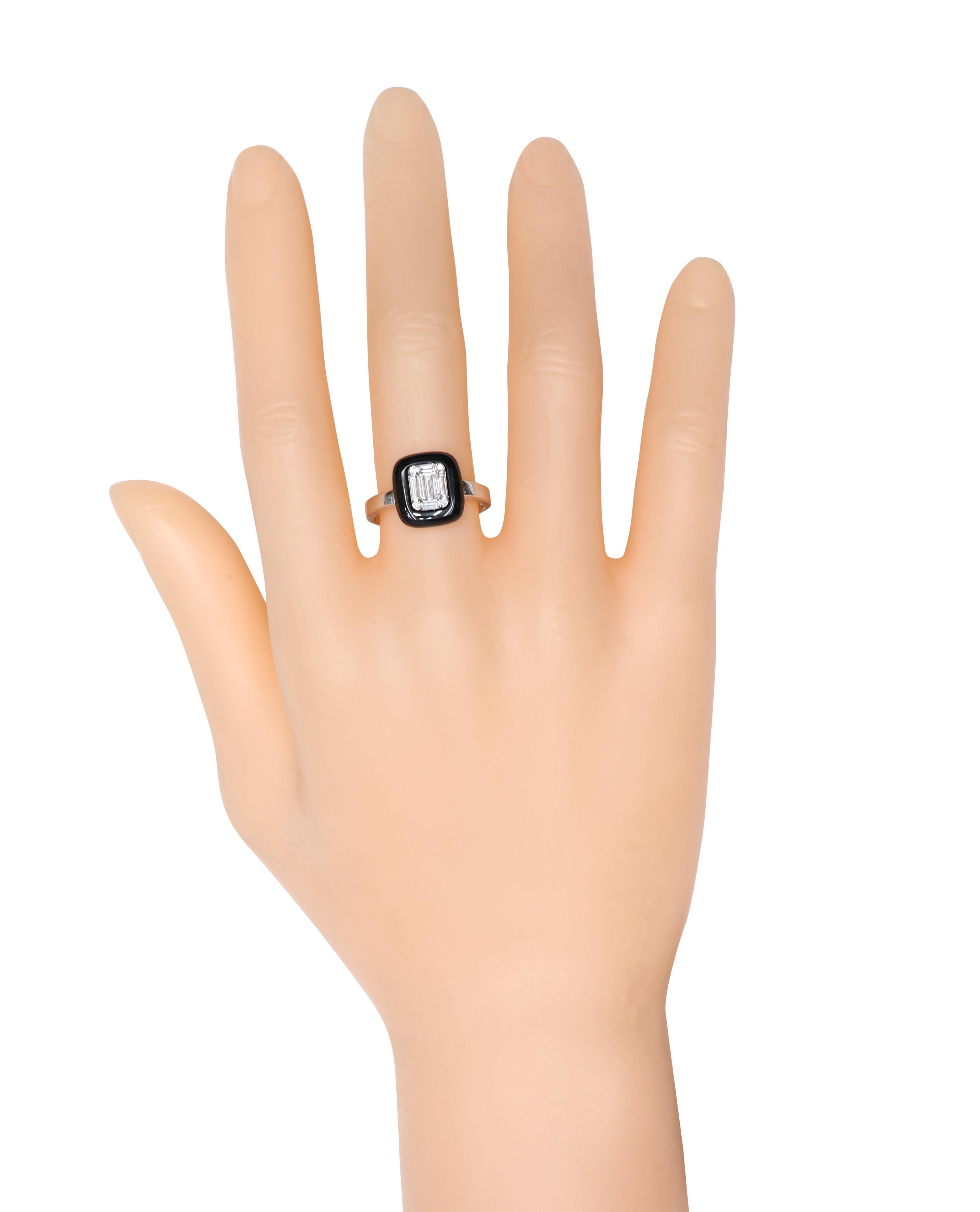 18 Karat White Gold Diamond and Black Onyx Cocktail Ring

This ring offers a beautiful combination of brilliance and craftsmanship. Its design is unique in its own way and will definitely make people ask you questions when you adorn it. This ring