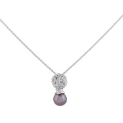 18 Karat White Gold Diamond and Black Pearl Dolphin Pendant Necklace