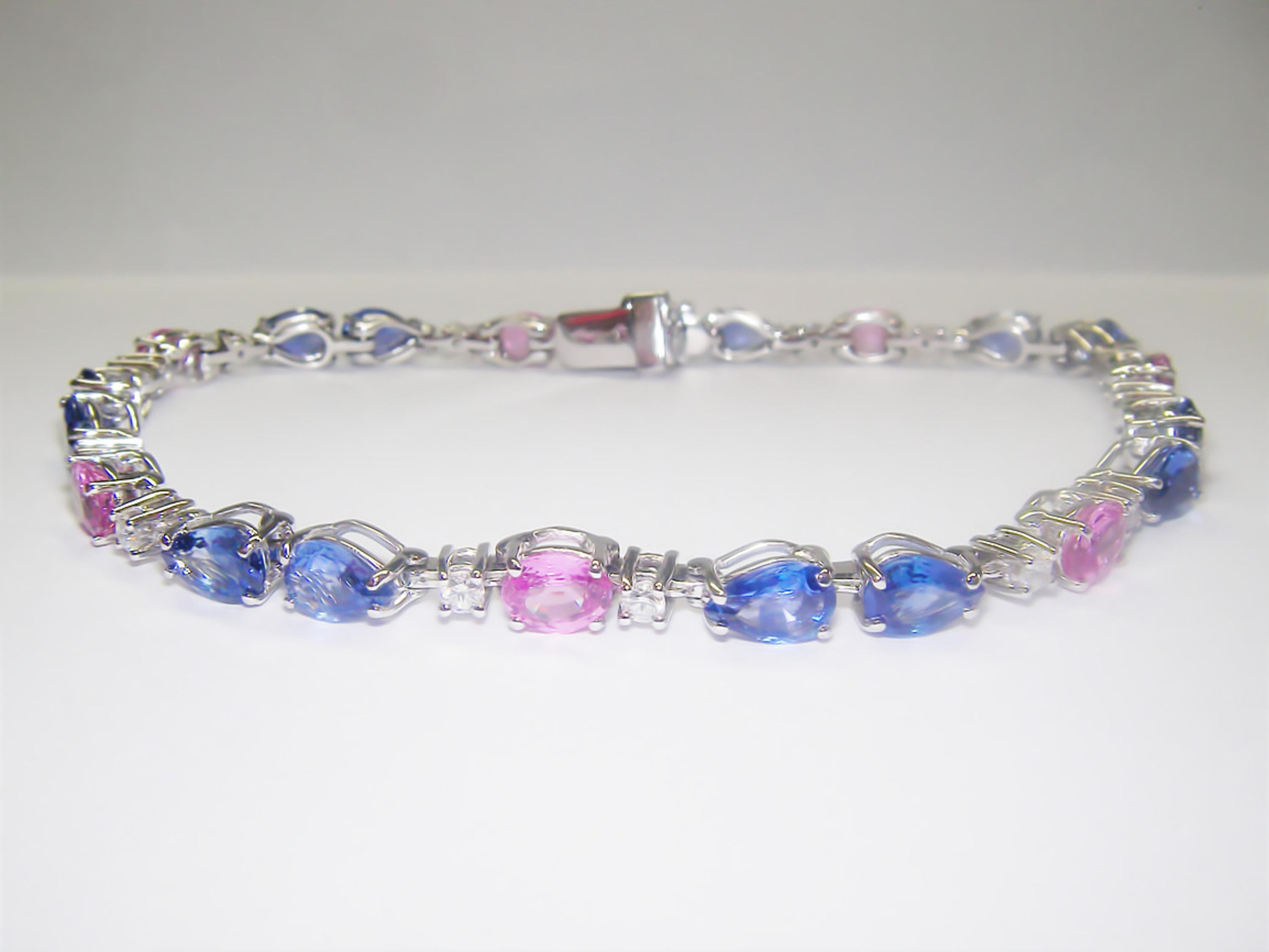 18 Karat White Gold Diamond Blue and Pink  Sapphire Bracelet

14 Diamonds 0.51 Carat H SI
14 Blue Sapphires  6,60 Carat
7 Pink Sapphires 2,95 Carat


Founded in 1974, Gianni Lazzaro is a family-owned jewelry company based out of Düsseldorf,