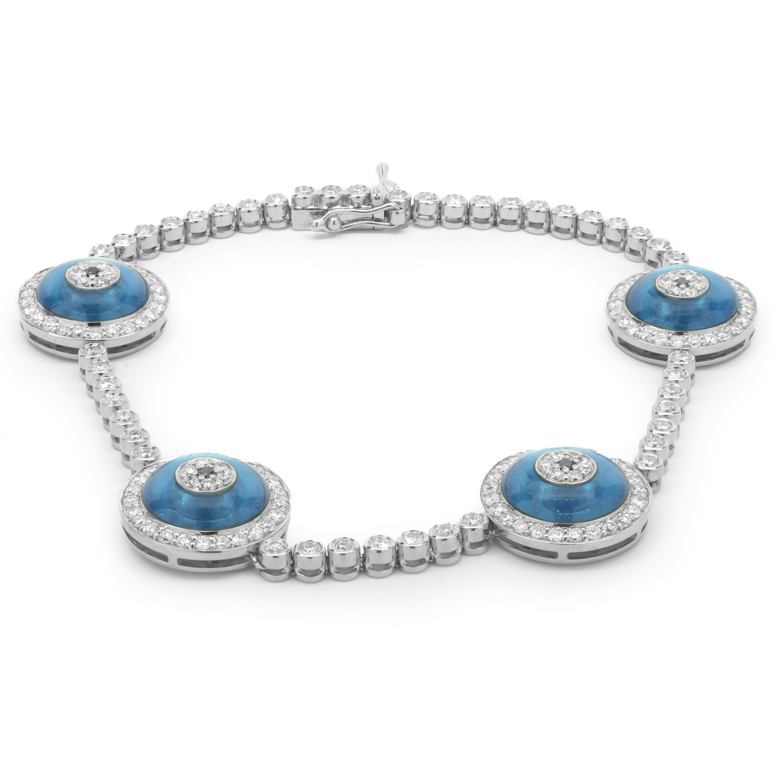 Designer: custom
Material: 18K white gold
Diamond: 172 round brilliant= 2.05cttw
Color: G 
Clarity: VS
Dimensions: bracelet will fit up to a 7-inch wrist
Weight: 14.27 grams