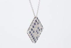 18 Karat White Gold Diamond and Blue Sapphire Necklace