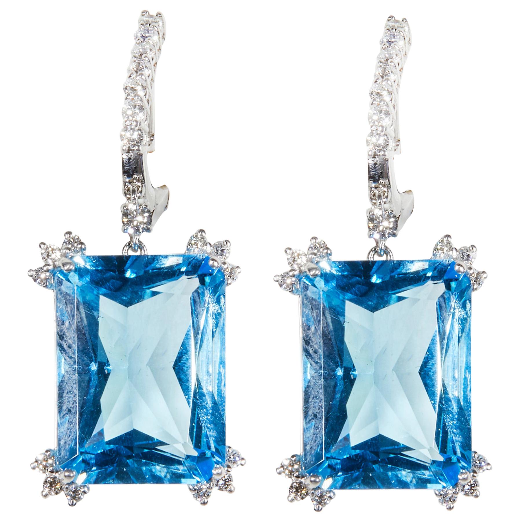 18 Karat White Gold Diamond and Blue Topaz Dangle Earrings